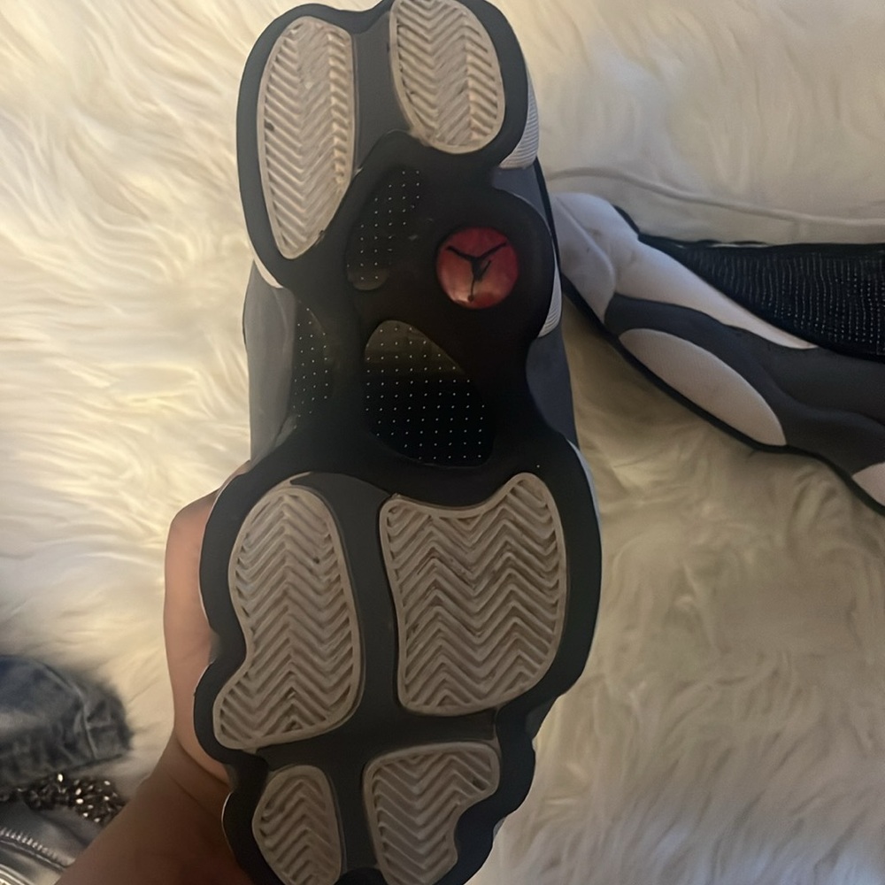 Black and Gray Sneakers with Red Logo
